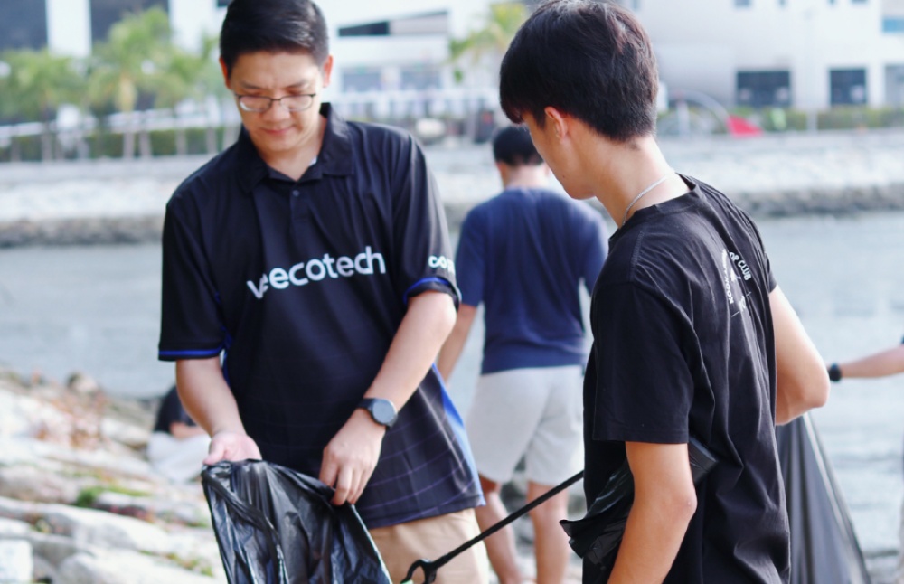 company beach cleaning event