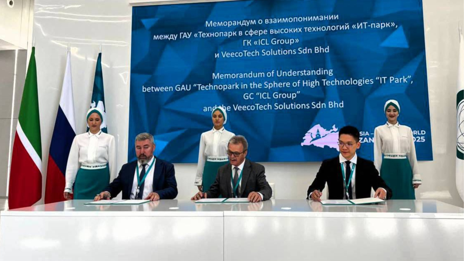 Alain Lye Signing MOU at KazanForum